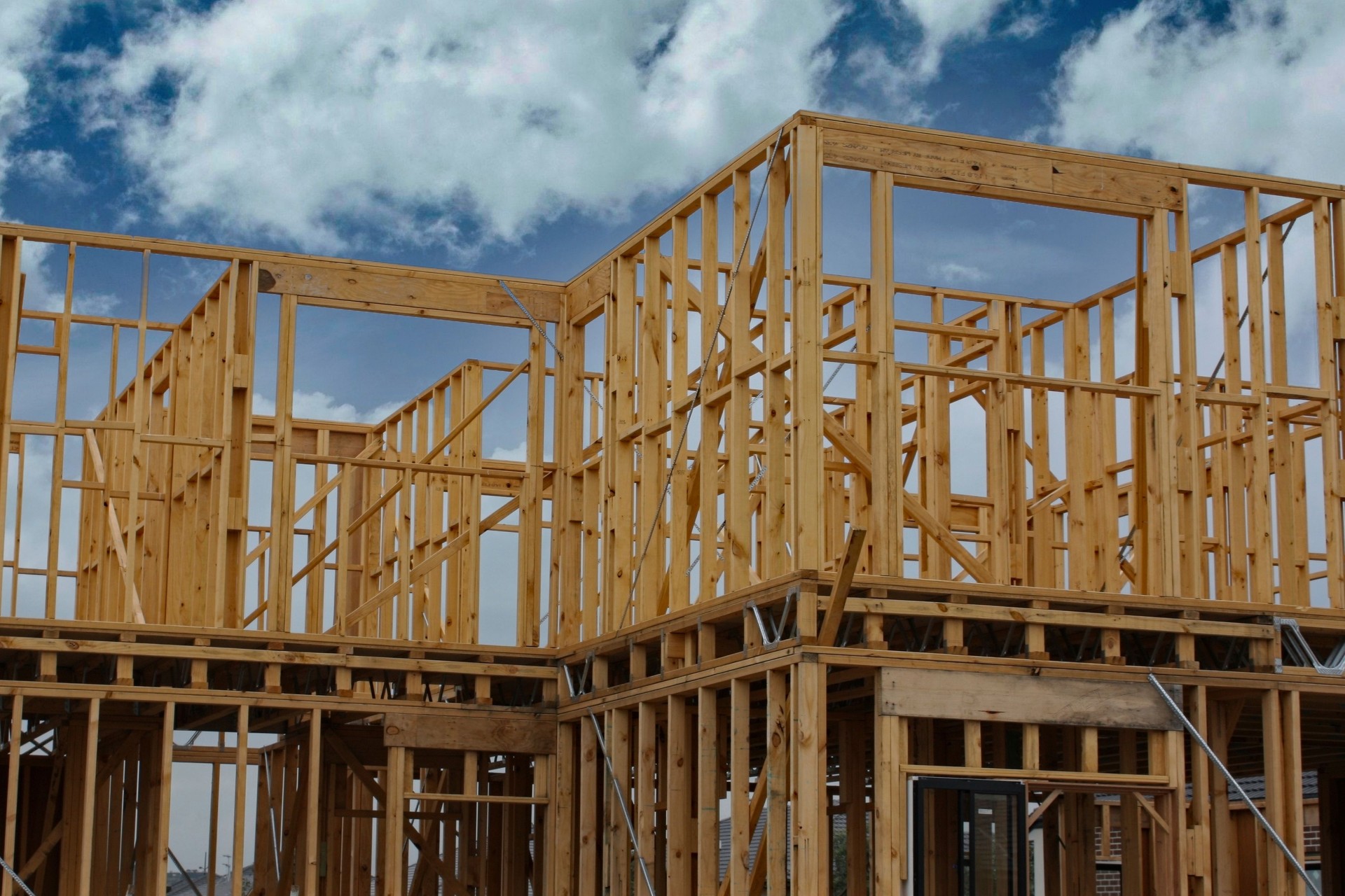 New suburban house under construction during an inflation economy